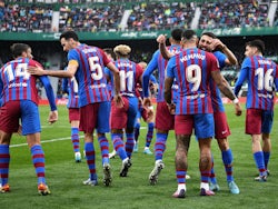 Barcelona's Memphis Depay celebrates scoring their second goal with teammates on March 6, 2022