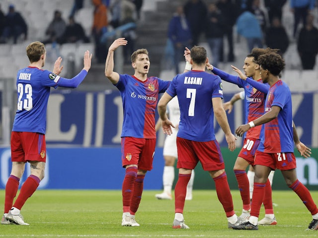 Basel's Sebastiano Esposito celebrates scoring their first goal with teammates on March 10, 2022