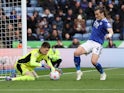 Leeds United's Illan Meslier in action with Leicester City's Caglar Soyuncu on March 5, 2022