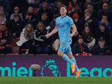Newcastle United's Chris Wood celebrates scoring their first goal on March 10, 2022