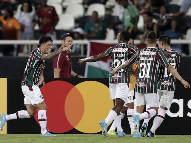 Fluminense's German Cano celebrates scoring their third goal with teammates on March 9, 2022