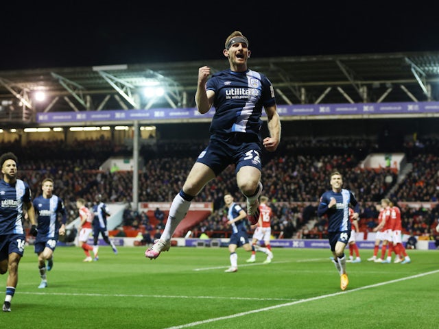 Huddersfield Town's Tom Lees celebrates scoring their first goal on March 7, 2022