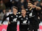 Fulham's Aleksandar Mitrovic celebrates scoring their first goal with teammates on March 8, 2022
