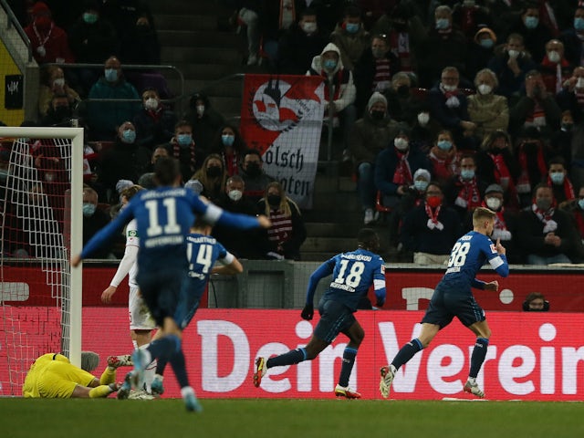 Hoffenheim's Stefan Posch celebrates scoring their first goal on March 6, 2022