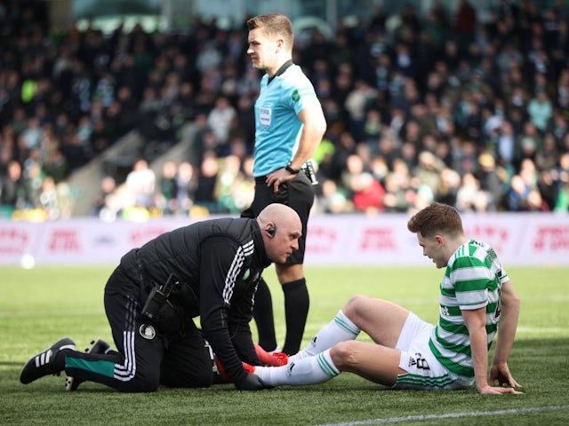Celtic's James Forrest receives medical attention after sustaining an injury on March 6, 2022