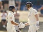 Joe Root congratulates England opener Zak Crawley after his second Test century against West Indies on March 11, 2022.