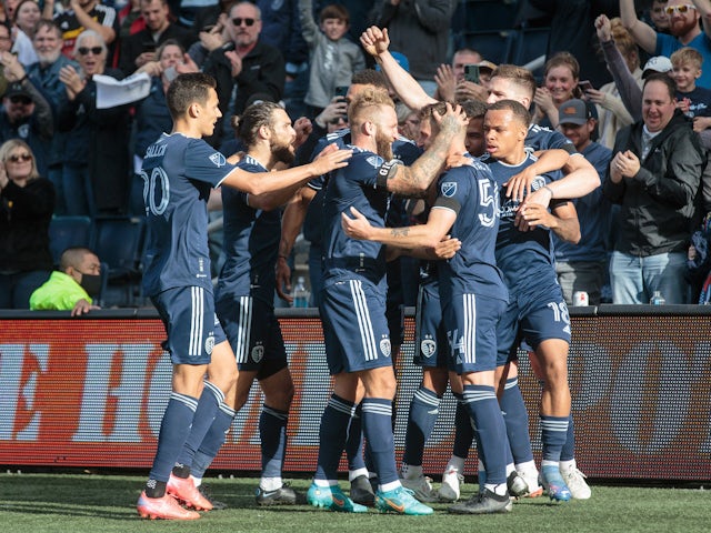 Sporting Kansas City celebrate with Sporting Kansas City midfielder Remi Walter (54) after he scored a goal during the second half against the Houston Dynamo at Children's Mercy Park on March 5, 2022