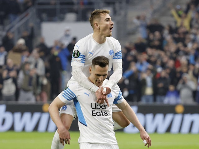 Marseille's Arkadiusz Milik celebrates scoring their first goal with teammates on March 10, 2022