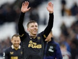 Newcastle United's Matt Targett celebrates after the match on February 19, 2022