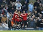 Manchester United's Jadon Sancho celebrates scoring their first goal with Alex Telles, Fred and Bruno Fernandes on March 6, 2022