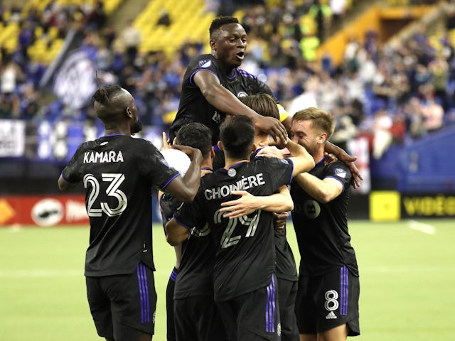 CF Montreal midfielder Lassi Lappalainen (21) celebrates his goal against Philadelphia Union with teammates during the first half at Olympic Stadium on March 5, 2022