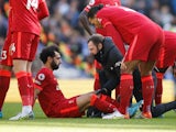 Mohamed Salah goes down injured for Liverpool on March 12, 2022
