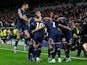 Paris Saint-Germain celebrate Kylian Mbappe's goal against Real Madrid on March 9, 2022