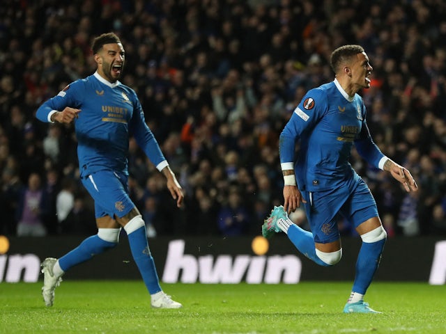 Rangers' Connor Goldson and James Tavernier celebrate after Allan McGregor saved a penalty on March 10, 2022