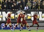 Roma's Sergio Oliveira celebrates scoring their first goal with Gianluca Mancini and teammates on March 10, 2022
