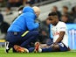 Tottenham Hotspur's Ryan Sessegnon receives medical attention on March 7, 2022