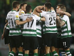 Sporting Lisbon's Islam Slimani celebrates scoring their first goal with teammates on March 5, 2022