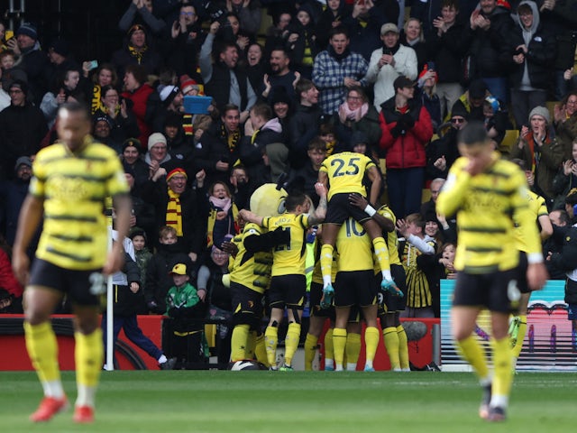 Watford's Cucho Hernandez celebrates scoring their first goal with teammates on March 6, 2022