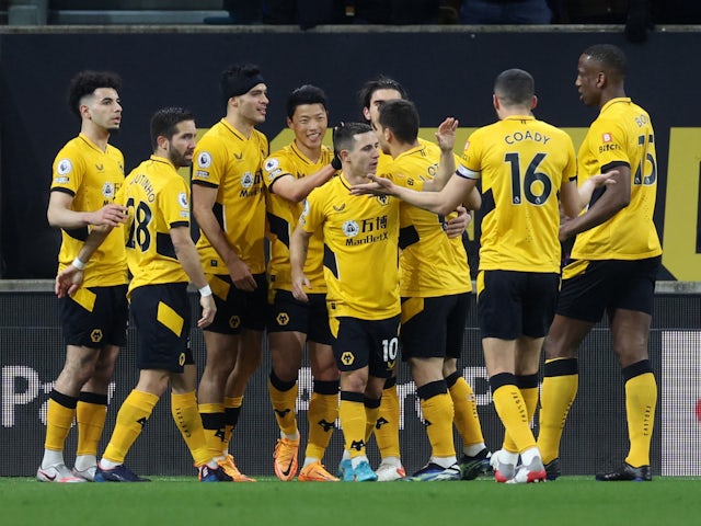 Wolverhampton Wanderers' Raul Jimenez celebrates scoring their first goal with teammates on March 10, 2022