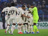AC Milan's Ismael Bennacer celebrates scoring their first goal with teammates on March 19, 2022