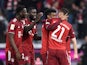 Bayern Munich's Kingsley Coman celebrates scoring their first goal with teammates on March 19, 2022