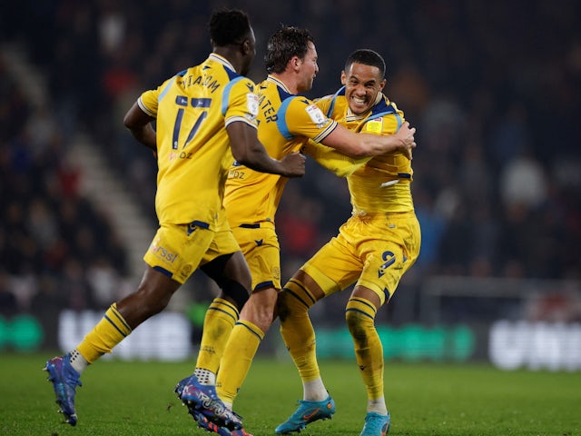 Reading's Tom Ince celebrates after scoring their first goal with teammates on March 15, 2022