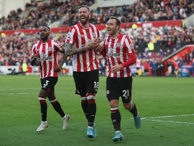 Brentford's Christian Eriksen and Pontus Jansson celebrate after Ivan Toney scores their first goal on March 12, 2022