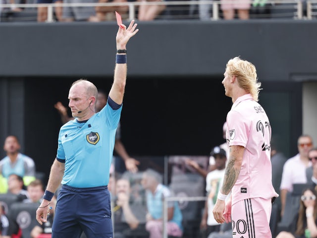 Referee Ted Unkel issues a red card to Inter Miami FC midfielder Brek Shea (20) during the first half against the Los Angeles FC at Inter Miami CF Stadium on March 12, 2022