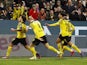 Borussia Dortmund's Axel Witsel celebrates scoring their first goal with Erling Braut Haaland and teammates on March 16, 2022
