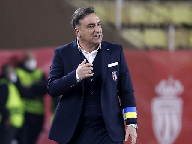Braga coach Carlos Carvalhal wearing an armband with Ukrainian colors in support of Ukraine amid Russia's invasion in Ukraine on March 17, 2022