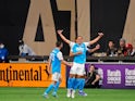 Charlotte FC defender Adam Armour (3) celebrates with teammates after scoring a goal against Atlanta United during the second half at Mercedes-Benz Stadium on March 13, 2022
