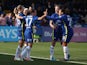Chelsea Women's Magdalena Eriksson celebrates scoring their first goal with teammates on March 20, 2022