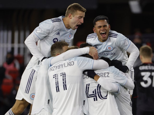 Chicago Fire defender Jonathan Bornstein (3) celebrates with his teammates after scoring a goal against DC United during the second half at Audi Field on March 12, 2022