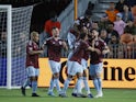 Colorado Rapids midfielder Mark-Anthony Kaye (14) celebrates with teammates after scoring a goal during the first half against the Houston Dynamo FC at PNC Stadium on March 19, 2022