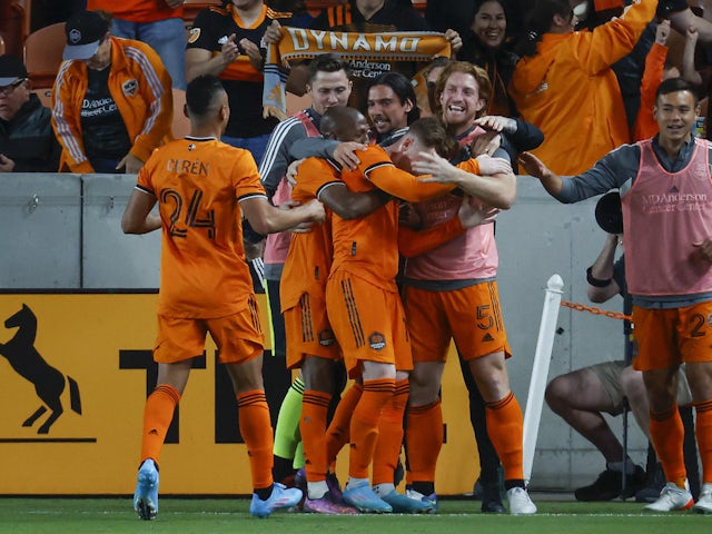 Houston Dynamo FC forward Tyler Pasher (19) celebrates with teammates after scoring a goal during the second half against the Colorado Rapids at PNC Stadium on March 19, 2022
