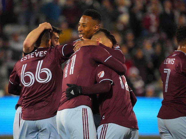 Colorado Rapids forward Diego Rubio (11) celebrates his goal with midfielder Mark-Anthony Kaye (14) and forward Michael Barrios (12) and defender Lucas Esteves (66) and midfielder Jack Price (19) in the first half against the Sporting Kansas City at Dick'