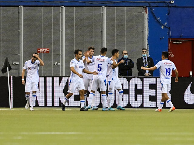 Cruz Azul players celebrating their first goal of the game during the first half at Olympic Stadium on March 16, 2022
