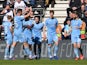 Coventry City's Callum O'Hare celebrates scoring their first goal with teammates on March 19, 2022