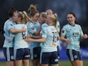 Leicester City Women's Jemma Purfield celebrates scoring their first goal with teammates on March 12, 2022