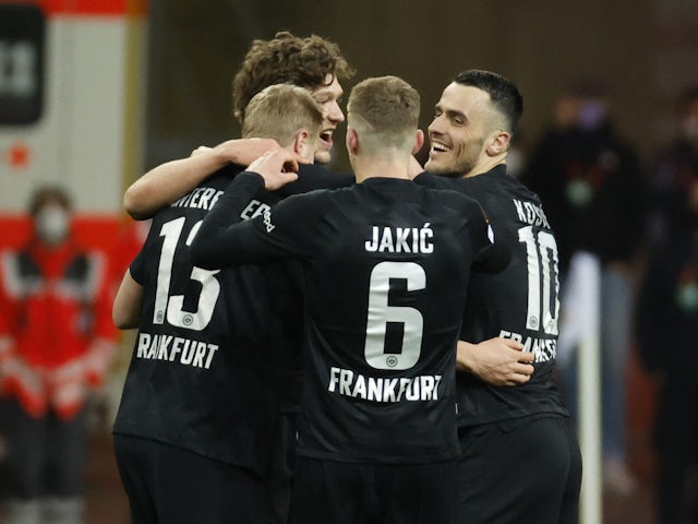 Eintracht Frankfurt's Martin Hinteregger celebrates scoring their first goal with teammates on March 17, 2022