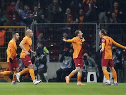 Galatasaray's Kerem Akturkoglu celebrates scoring their first goal with teammates on March 14, 2022