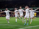 Leeds United's Luke Ayling celebrates scoring their third goal with teammate son March 18, 2022