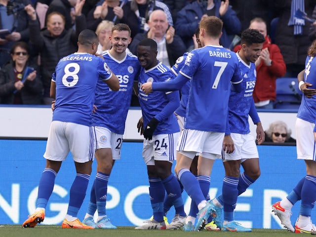 Leicester City's Timothy Castagne celebrates scoring their first goal with Youri Tielemans and Nampalys Mendy on March 20, 2022
