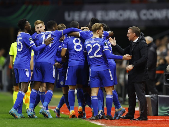 Leicester City's Wesley Fofana celebrates scoring their first goal with teammates and manager Brendan Rodgers on March 17, 2022