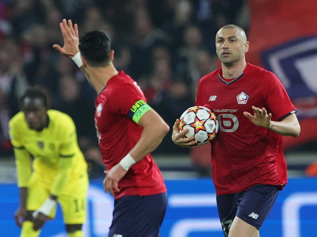 Lille's Burak Yilmaz celebrates scoring their first goal on March 16, 2022