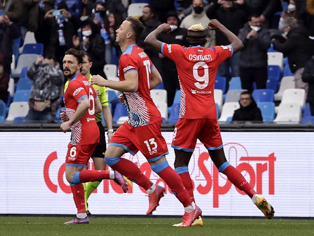 Napoli's Victor Osimhen celebrates scoring their first goal with teammates on March 19, 2022