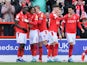 Nottingham Forest's Keinan Davis celebrates scoring their first goal with teammates on March 12, 2022