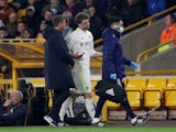 Leeds United's Patrick Bamford walks off the pitch after sustaining an injury on March 17, 2022