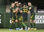 Portland Timbers defender Bill Tuiloma (25) celebrates with teammates after scoring a goal during the second half against Austin FC at Providence Park on March 12, 2022
