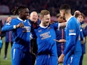 Rangers' Scott Arfield celebrates after the match with teammates on March 17, 2022